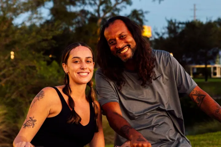 couple riding bikes at Armature Works