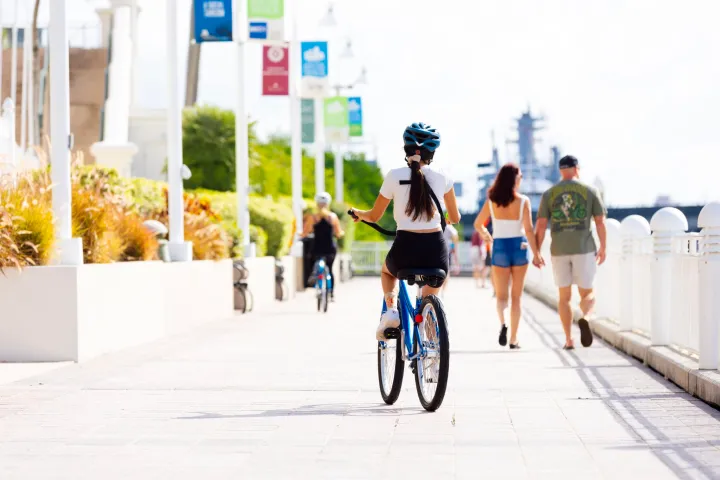 a women on the back on of a bike